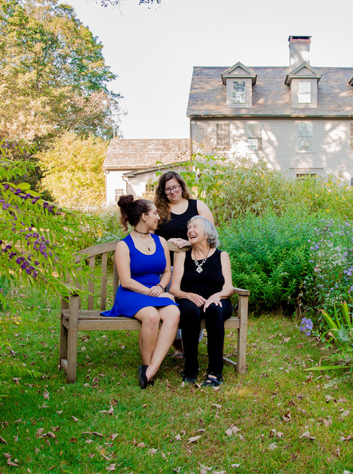 Jan with LEAD students in front of her Haddam home.